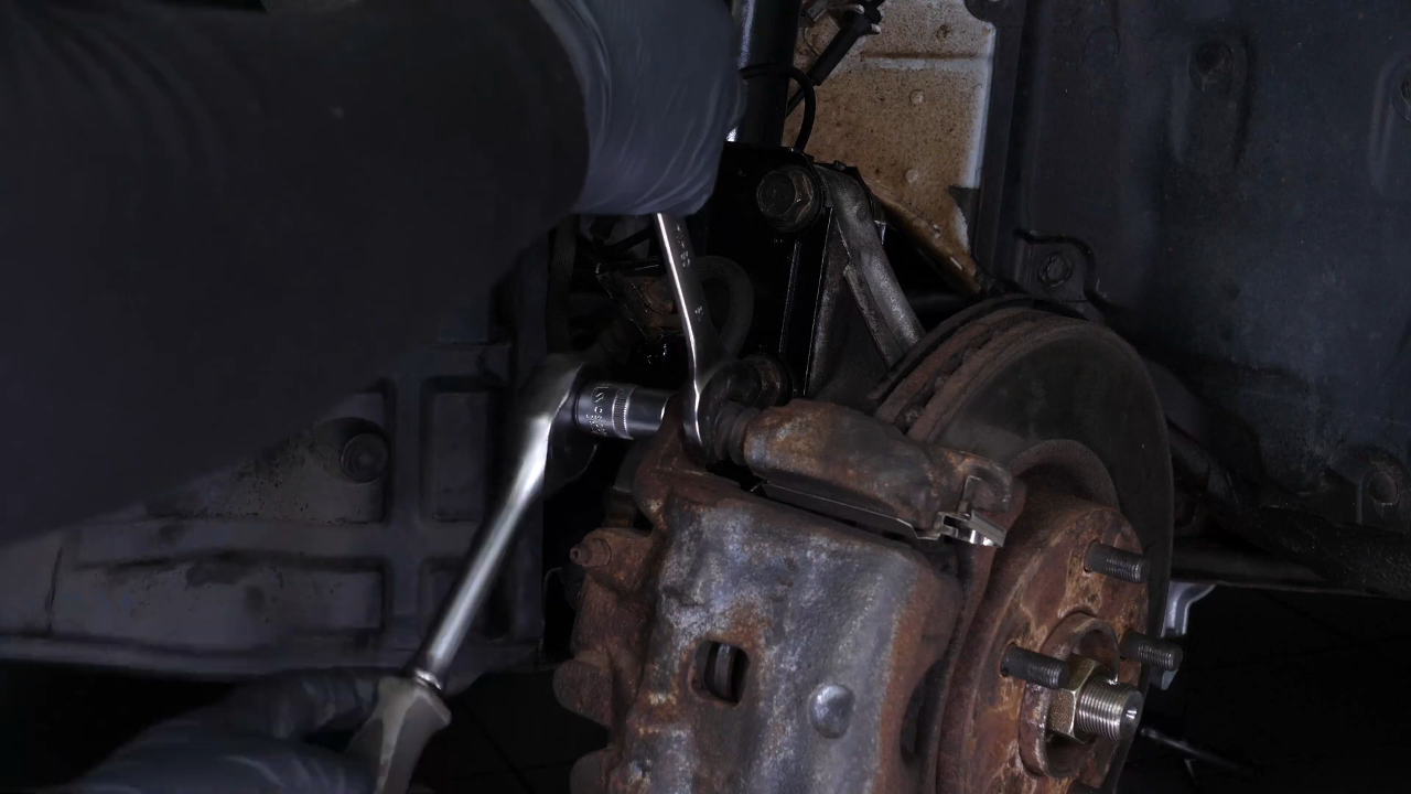 Remove the brake caliper