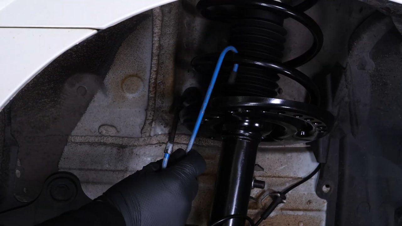 Remove the brake caliper