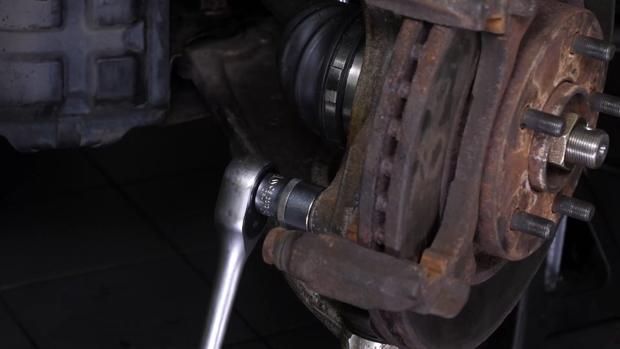 Remove the  brake caliper mount