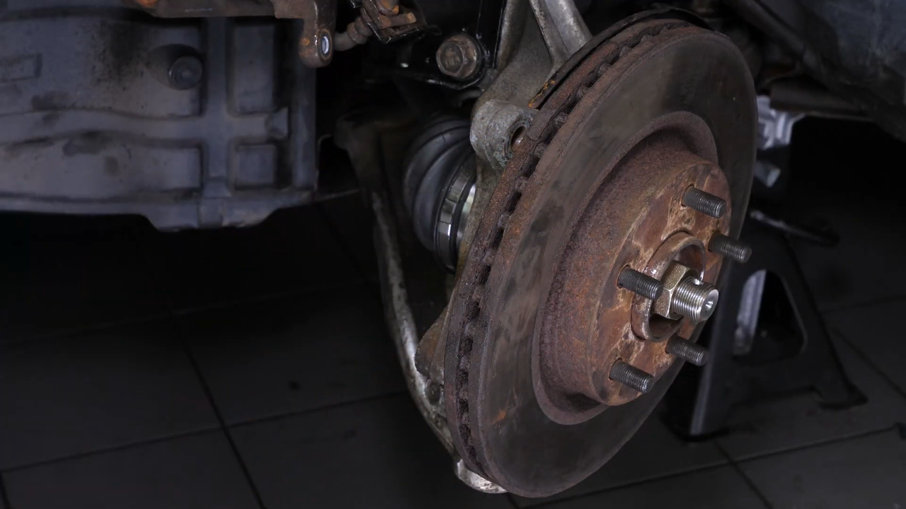 Remove the  brake caliper mount