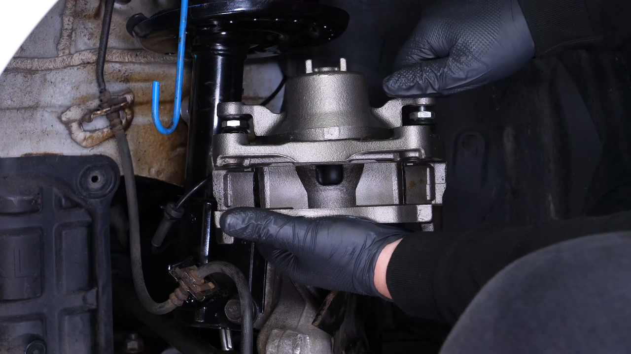 Replace the brake caliper