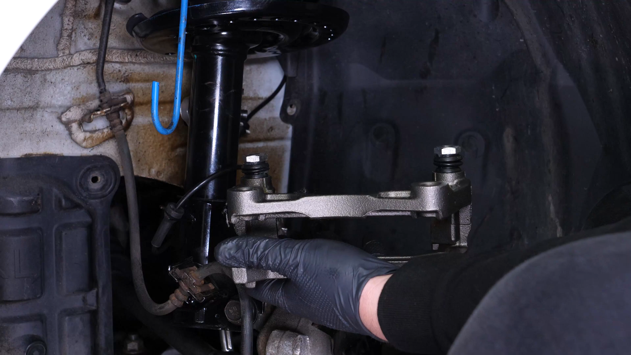 Replace the brake caliper