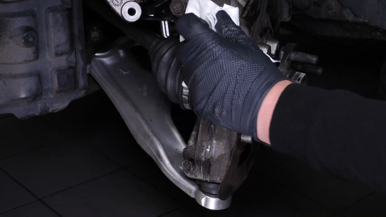 Put the brake caliper mount back on