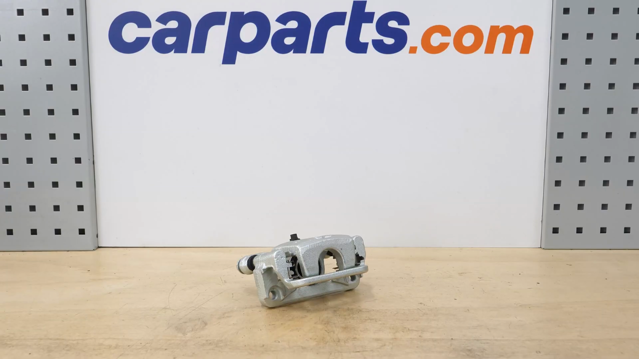 Put the brake caliper mount back on