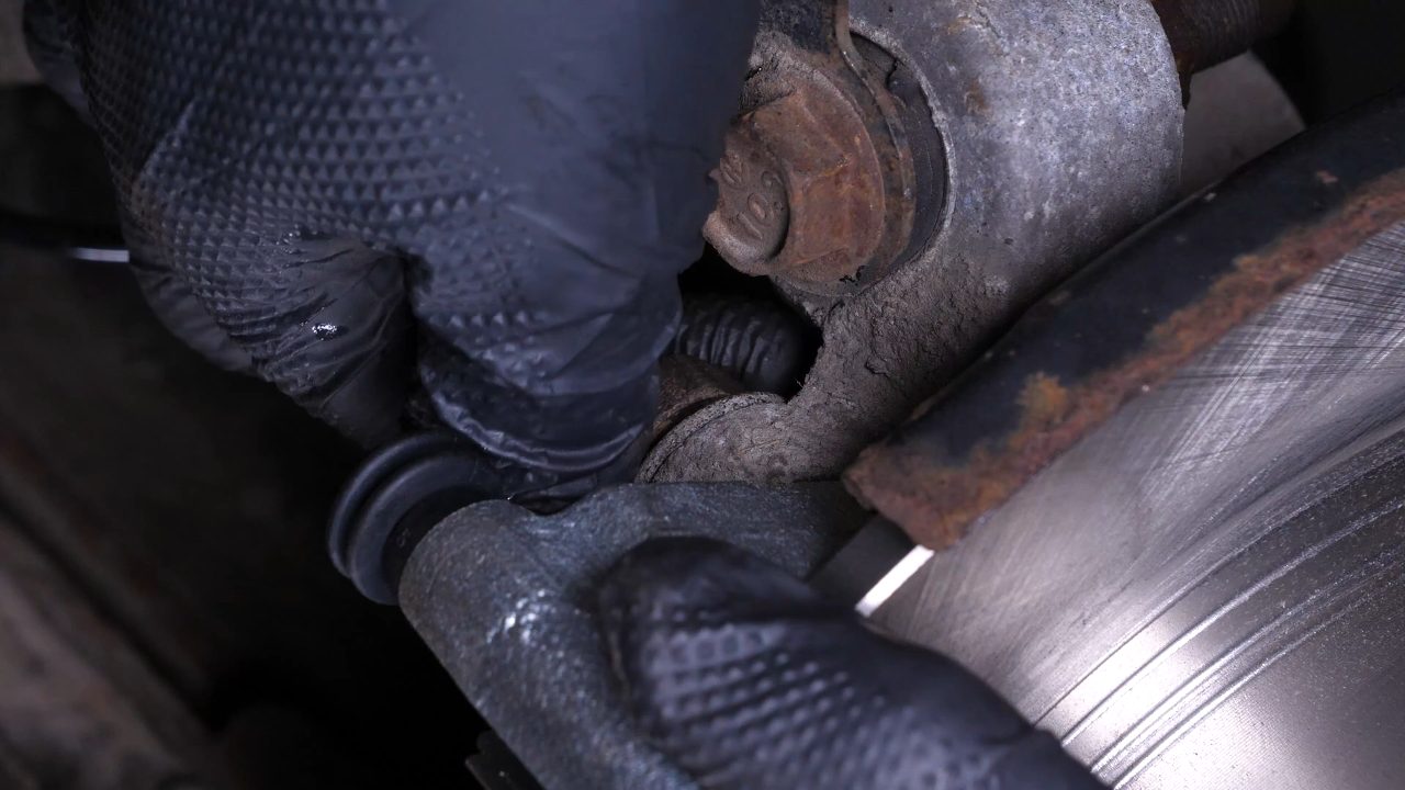 Put the brake caliper mount back on