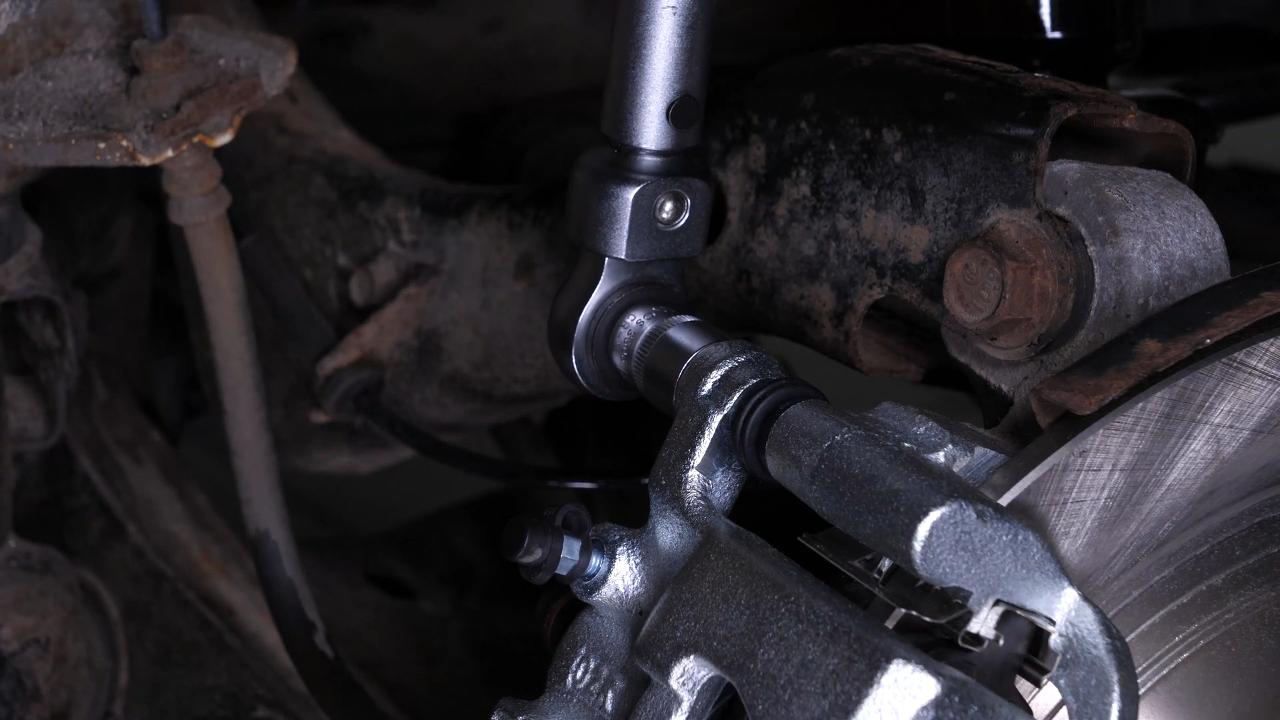 Put the brake caliper back