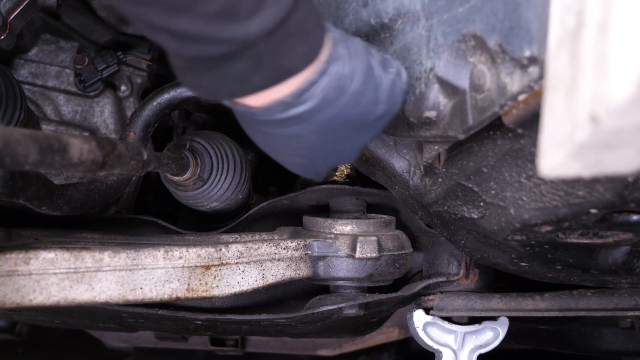 Remove the control arm ball joint
