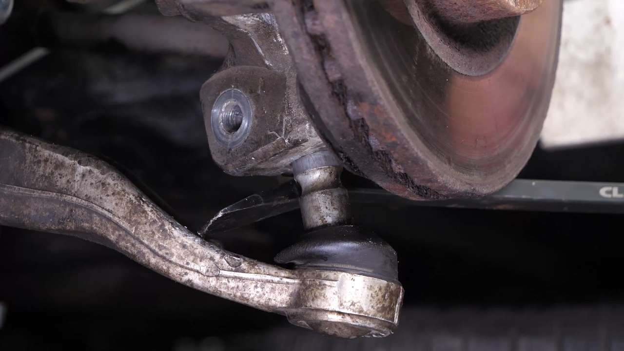 Remove the control arm ball joint