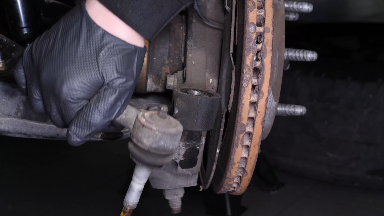Remove the outer tie rod
