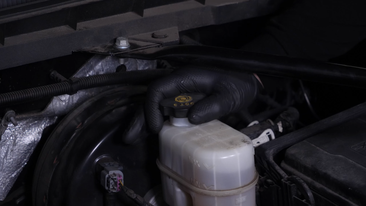 Open the brake fluid reservoir