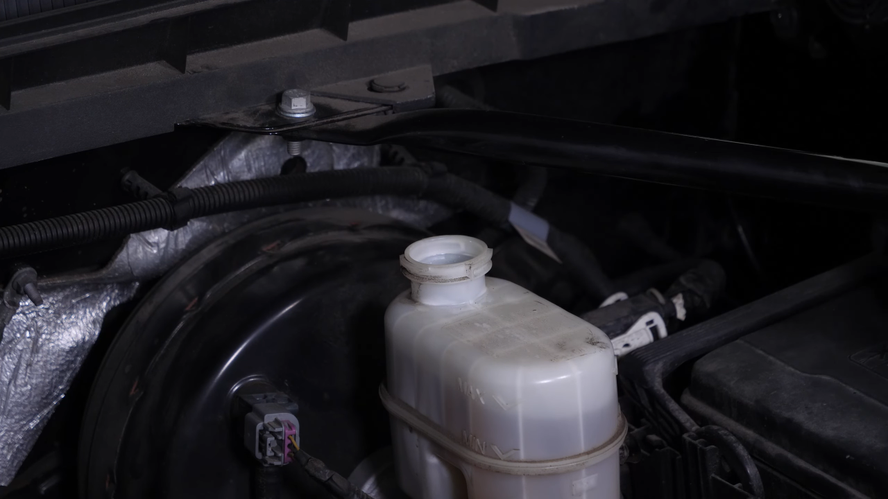 Open the brake fluid reservoir