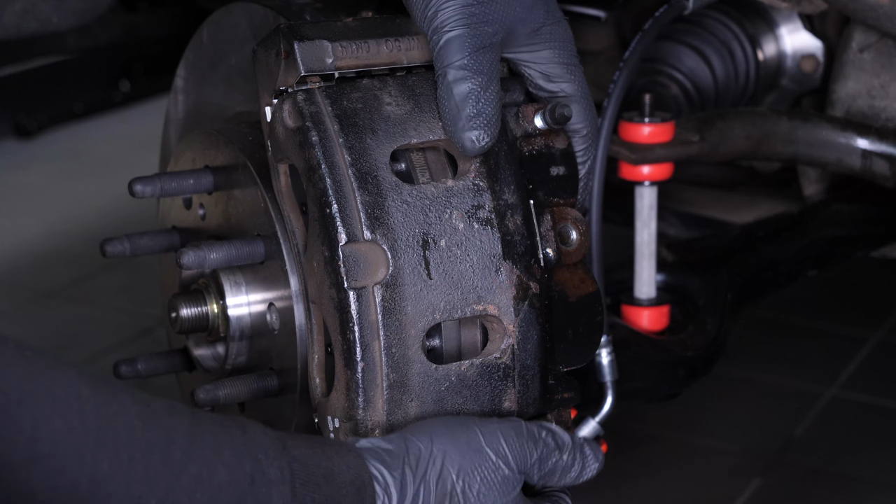 Remove the brake caliper