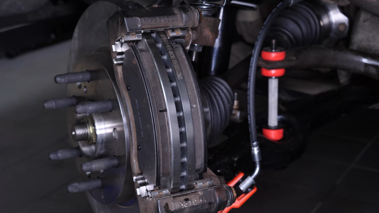 Remove the brake caliper