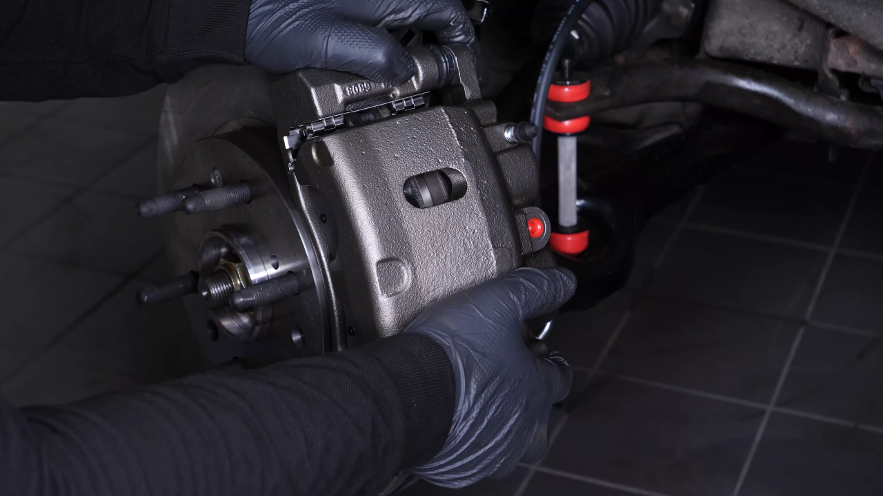 Replace the brake caliper