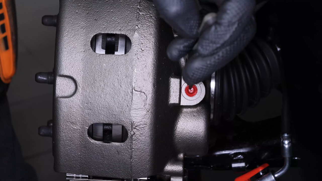 Screw the brake hose back on the caliper