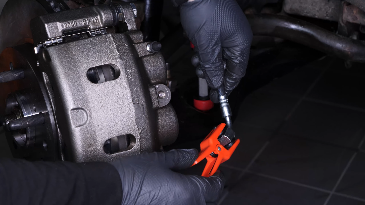 Screw the brake hose back on the caliper