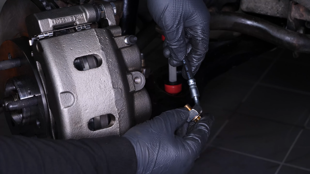 Screw the brake hose back on the caliper
