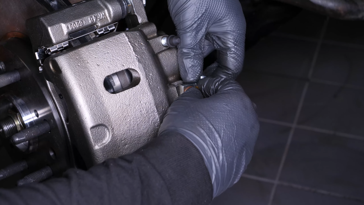 Screw the brake hose back on the caliper