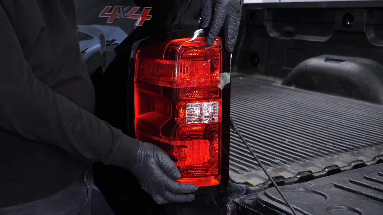 Access the tail light housing