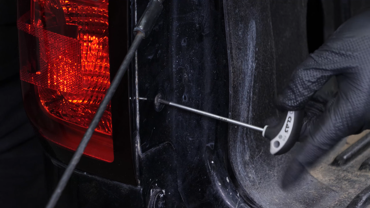 Access the tail light housing
