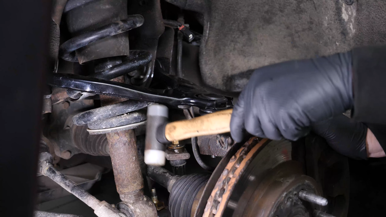 Remove the control arm ball joint