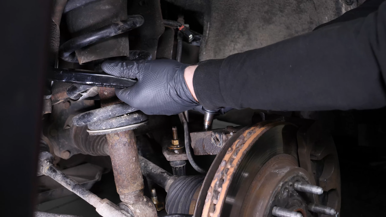 Remove the control arm ball joint