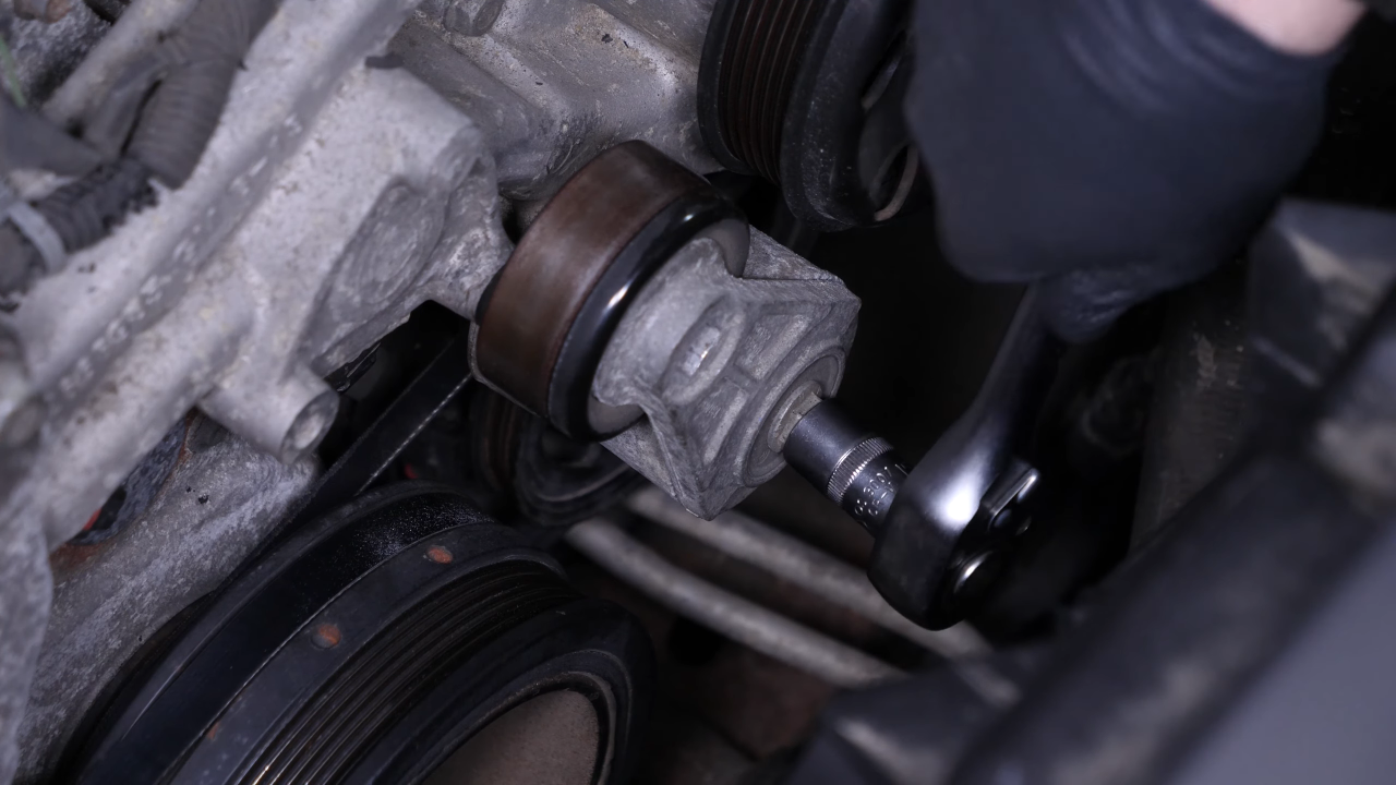 Remove the belt tensioner