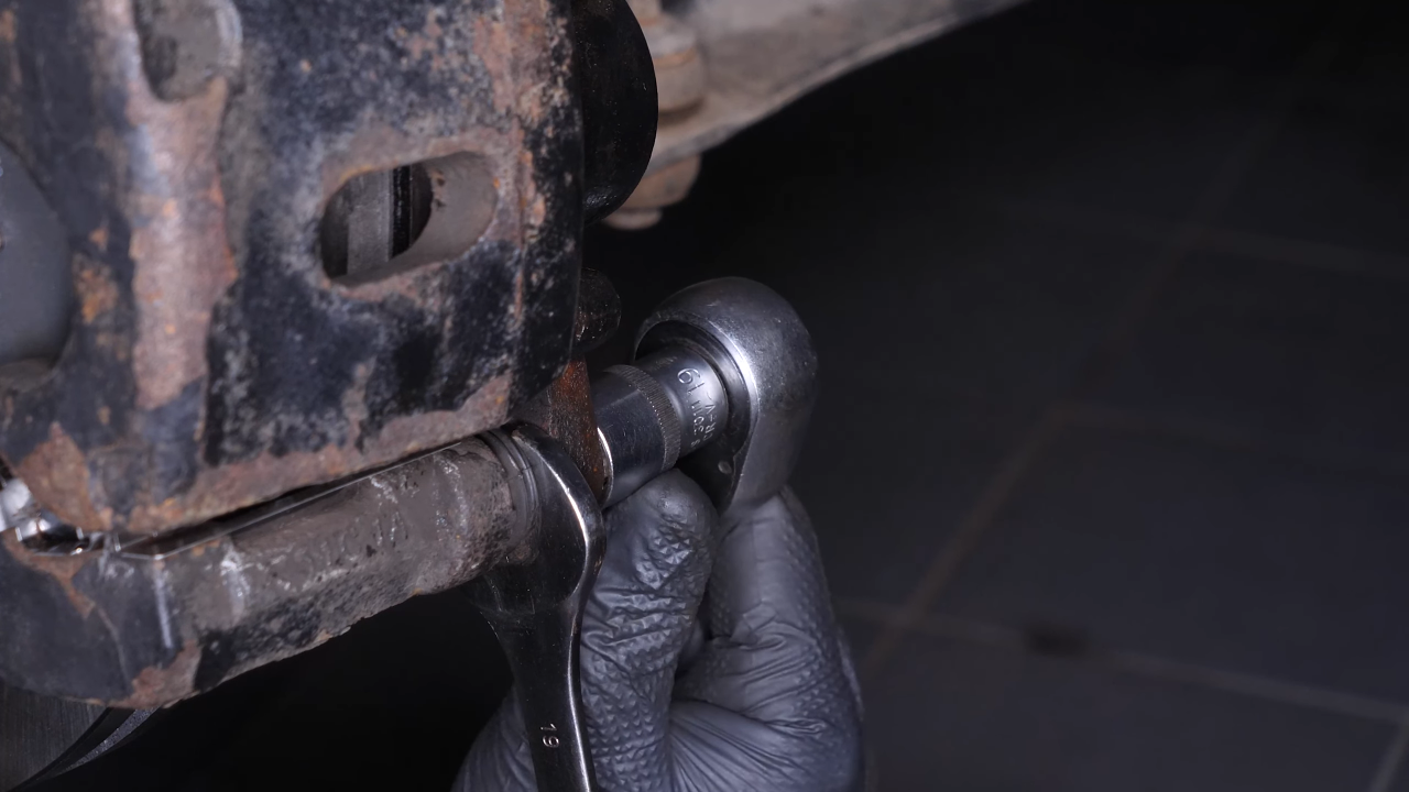 Remove the  brake caliper