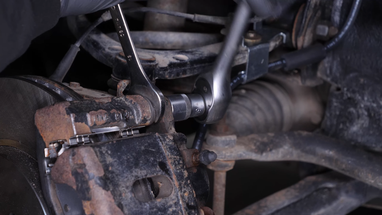 Remove the  brake caliper