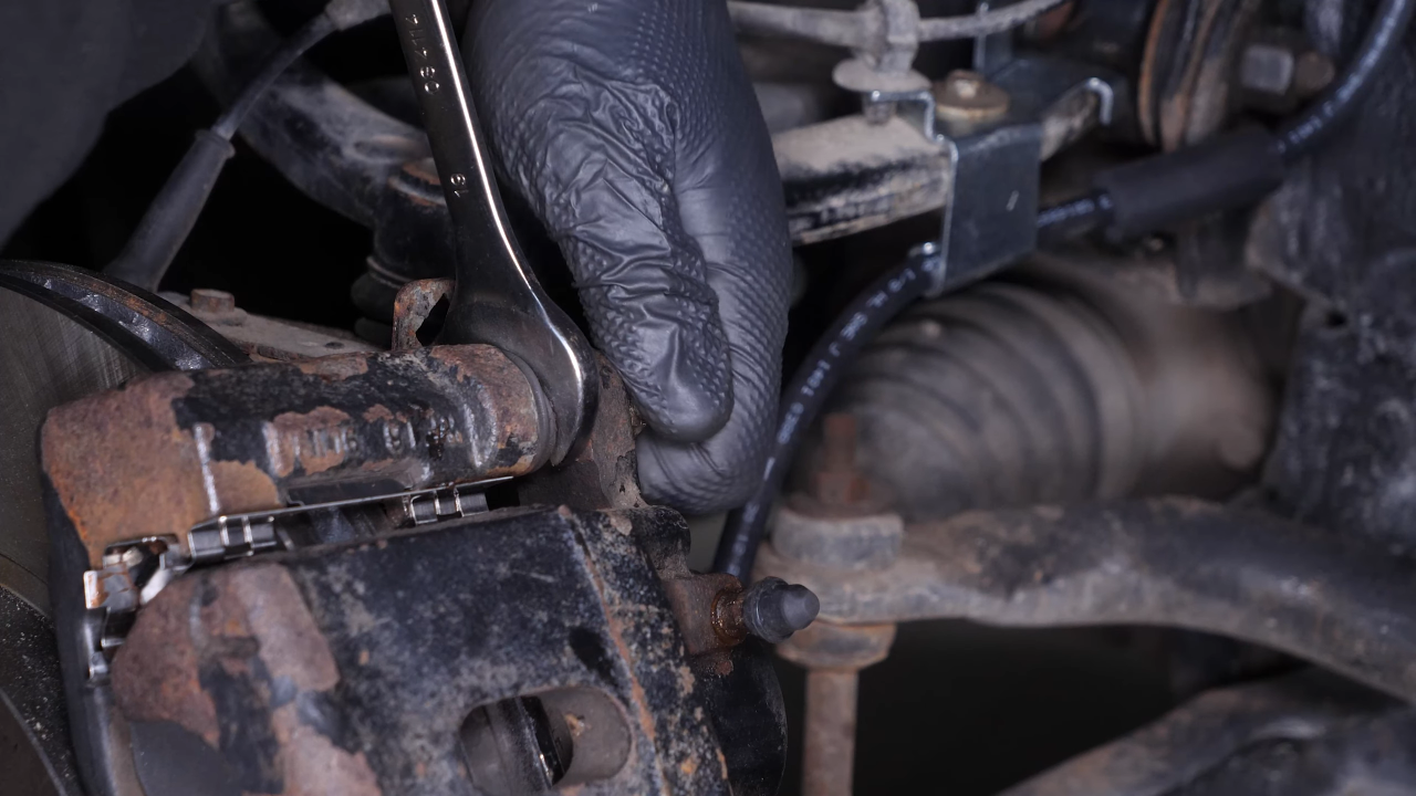 Remove the  brake caliper
