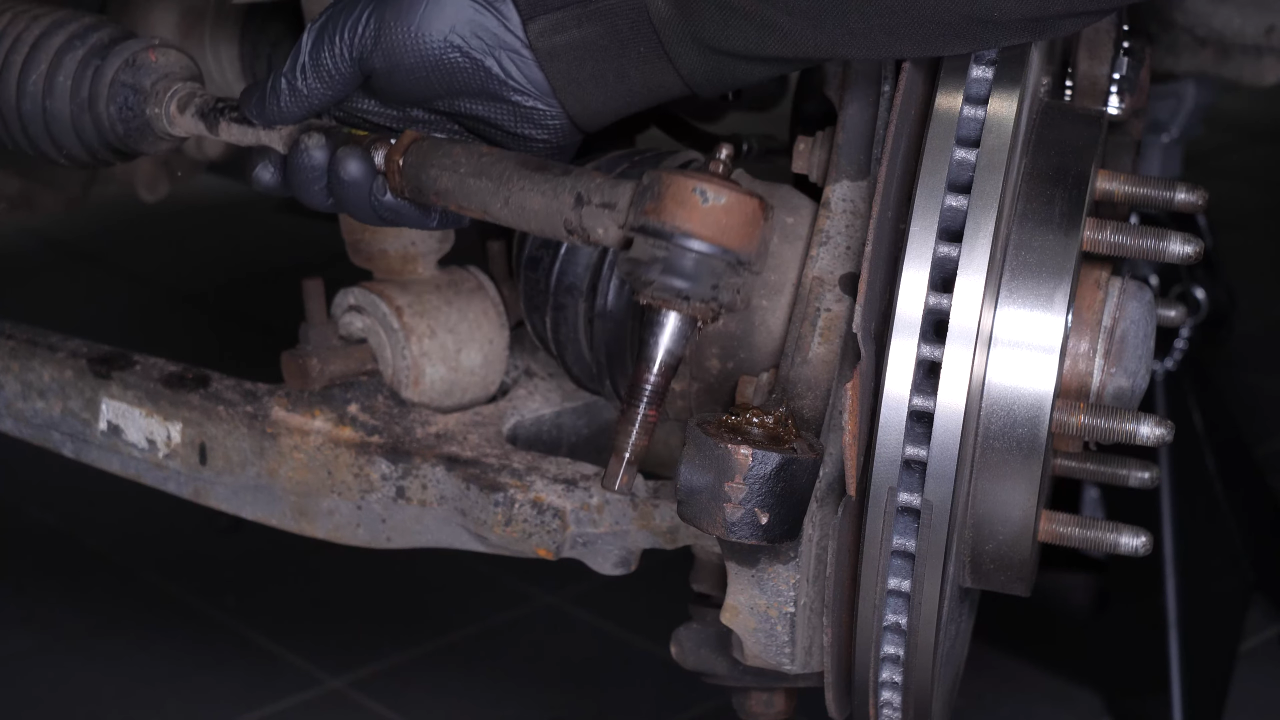 Remove the outer tie rod