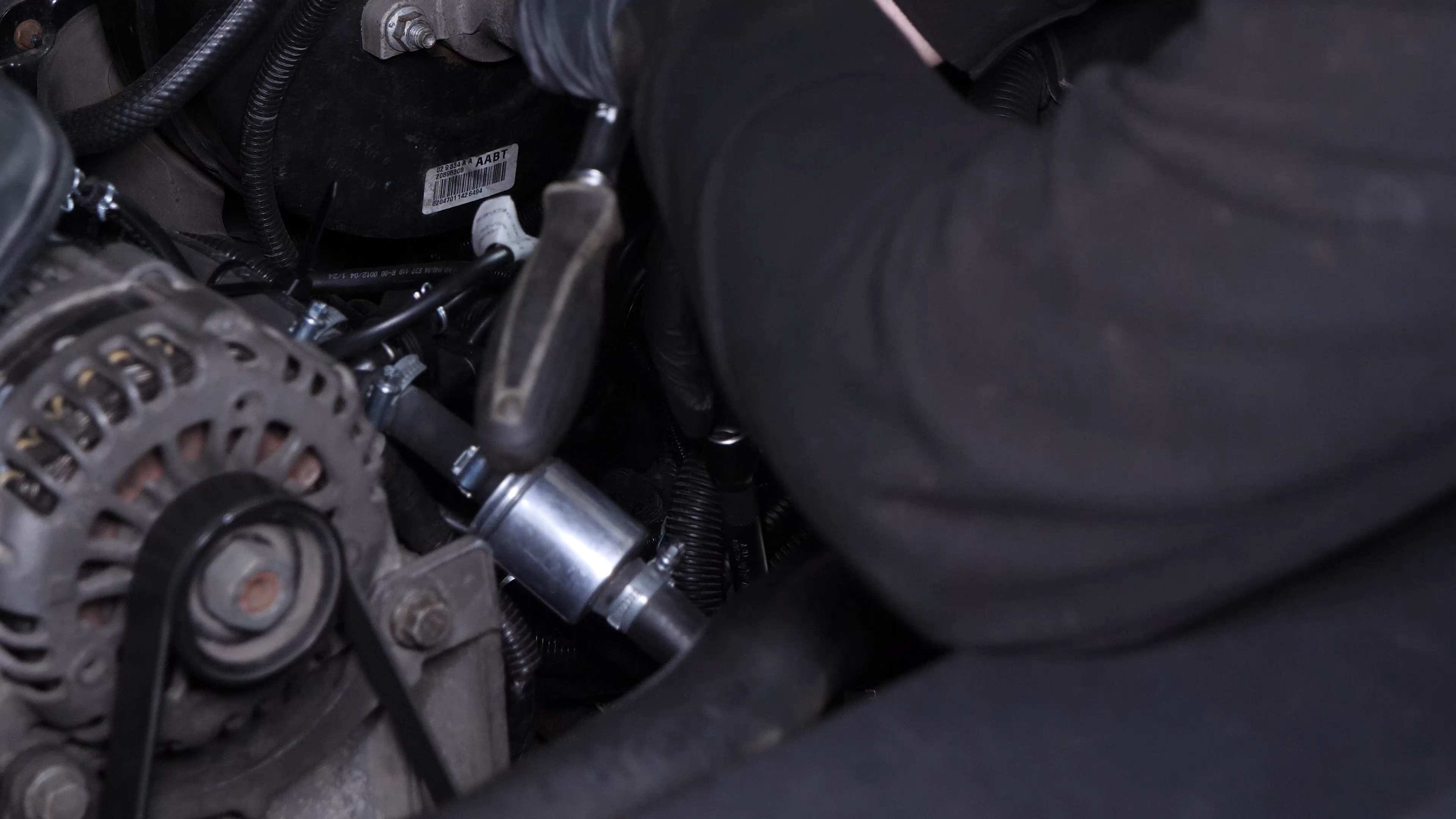 Unscrew the strut mount bearing nuts
