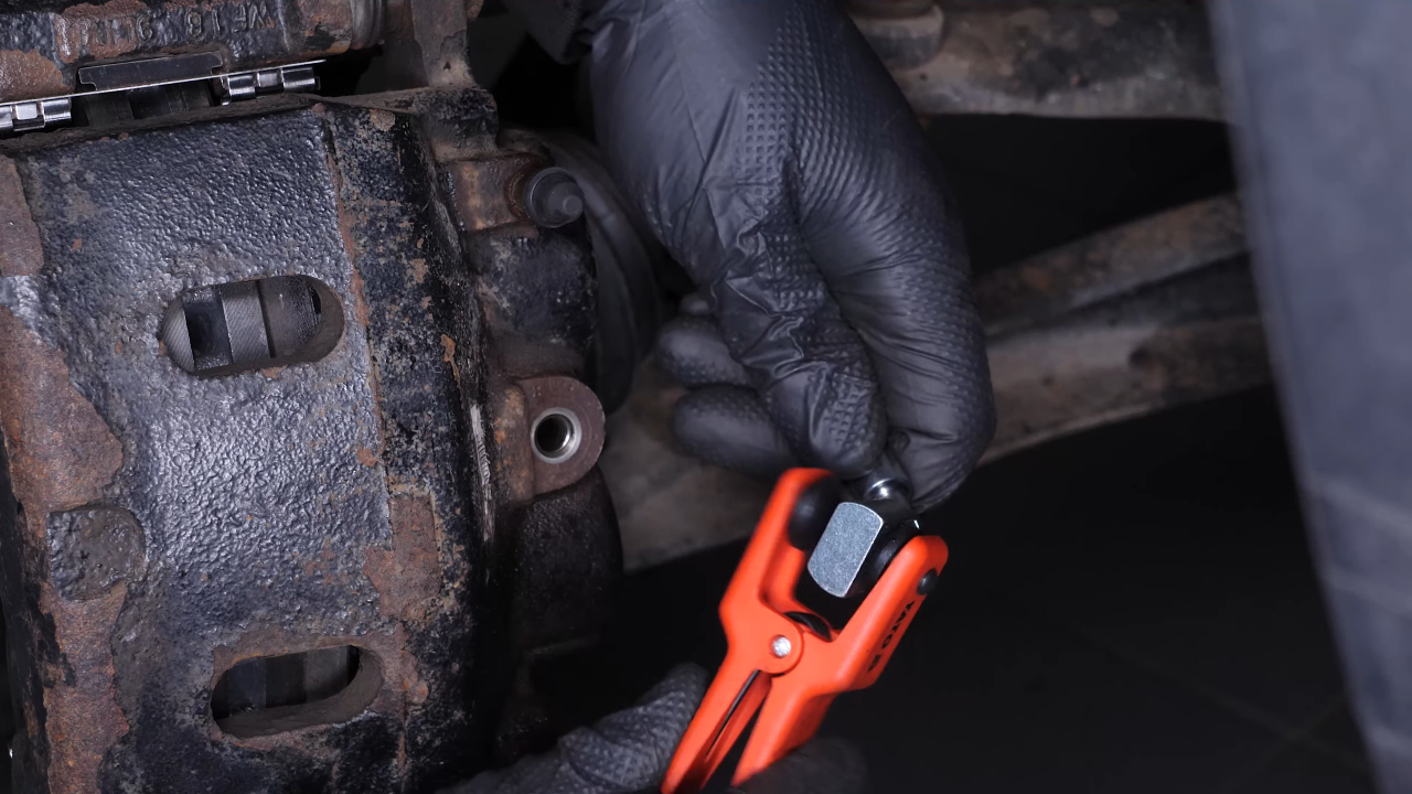 Screw the brake hose back on the caliper