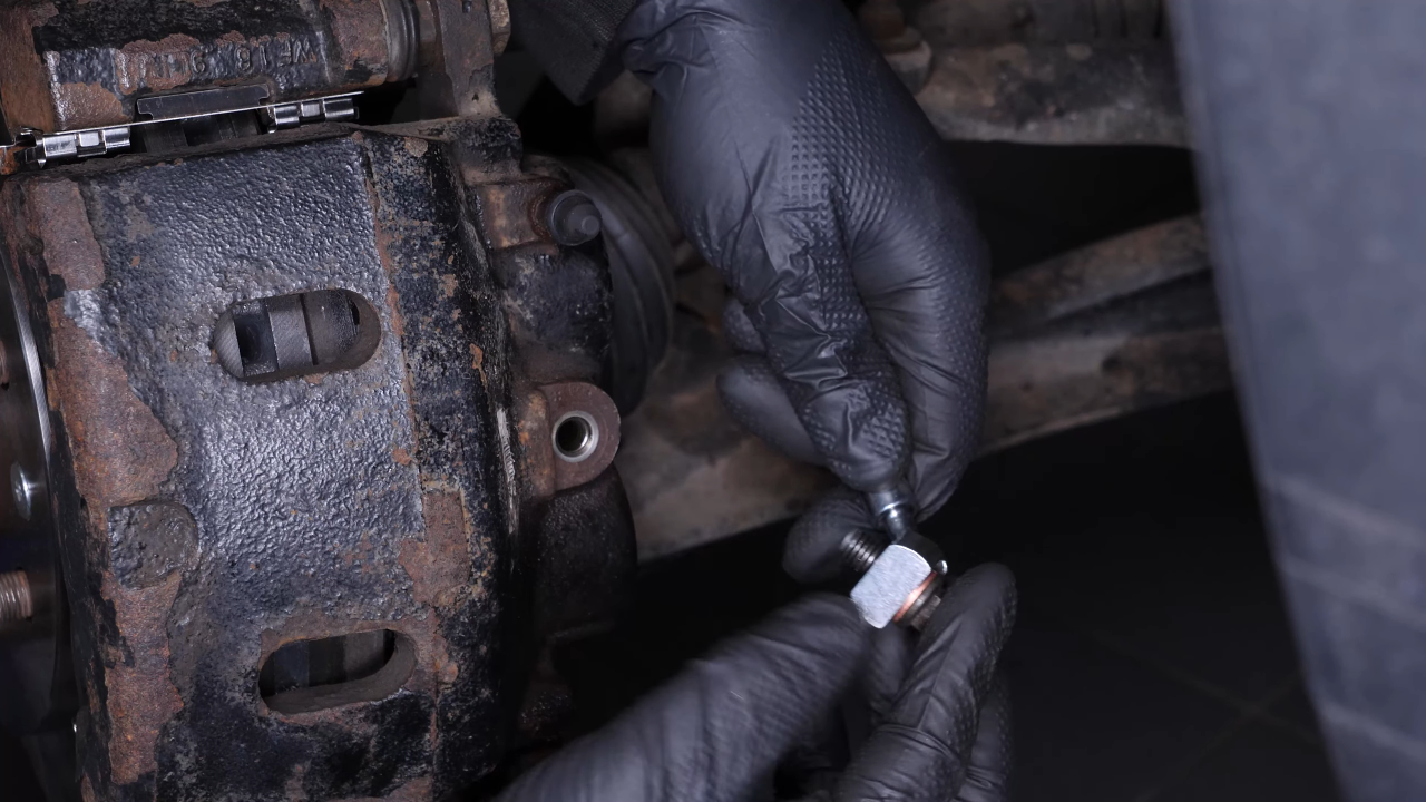 Screw the brake hose back on the caliper
