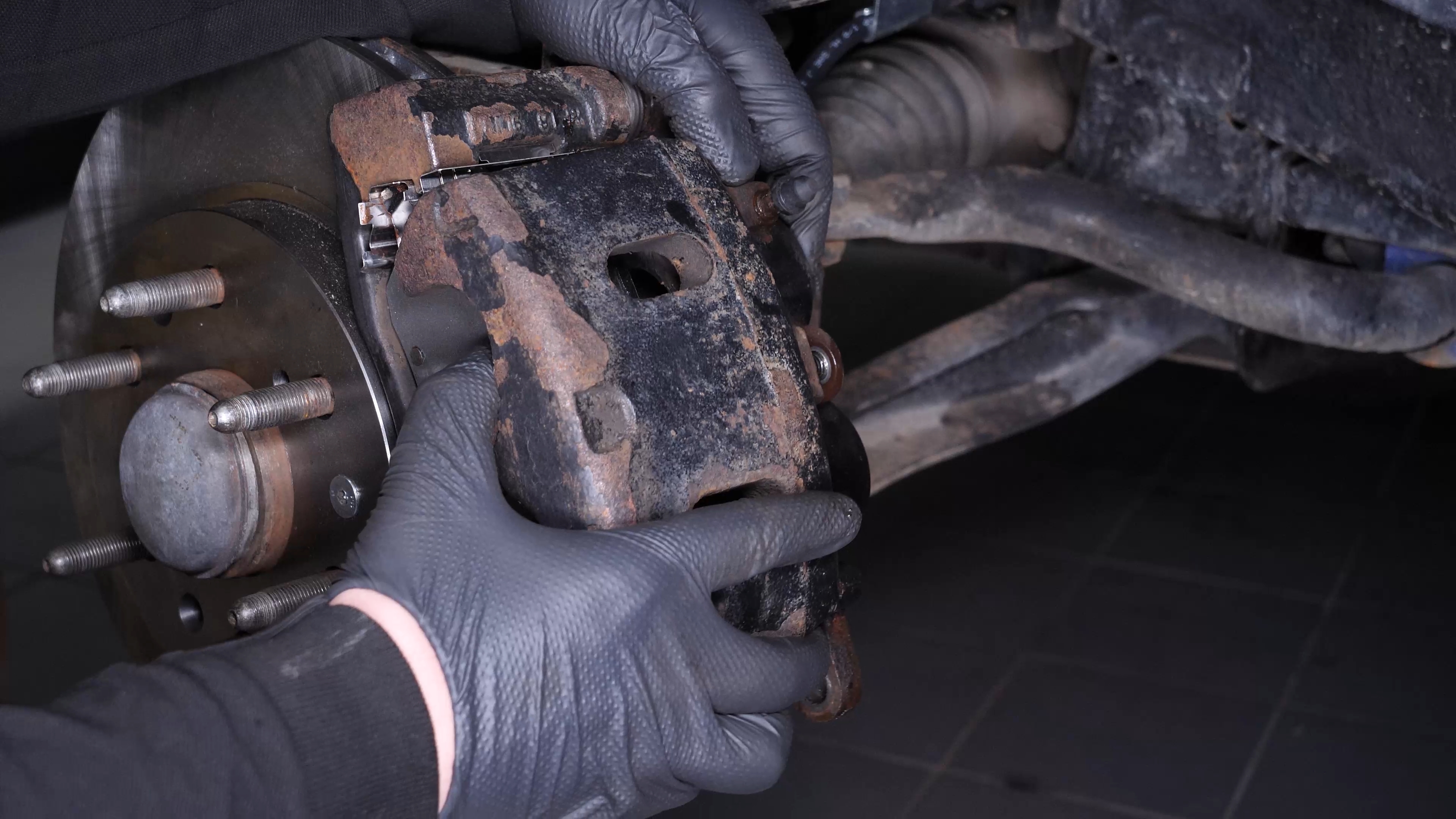 Remove the brake caliper