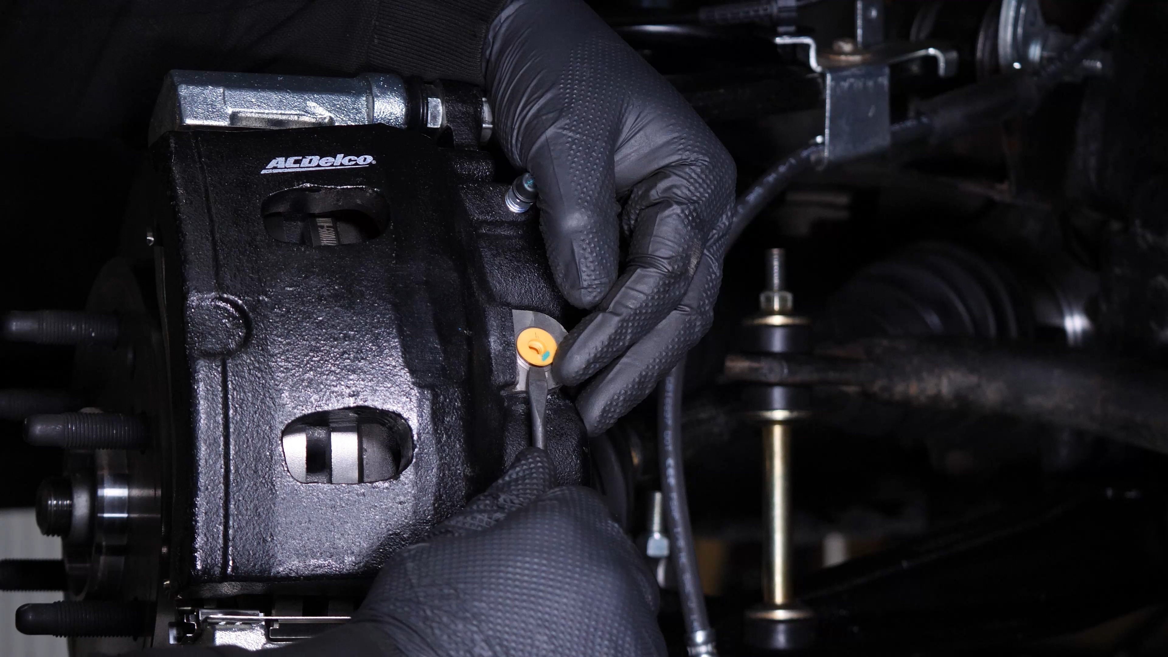 Screw the brake hose back on the caliper