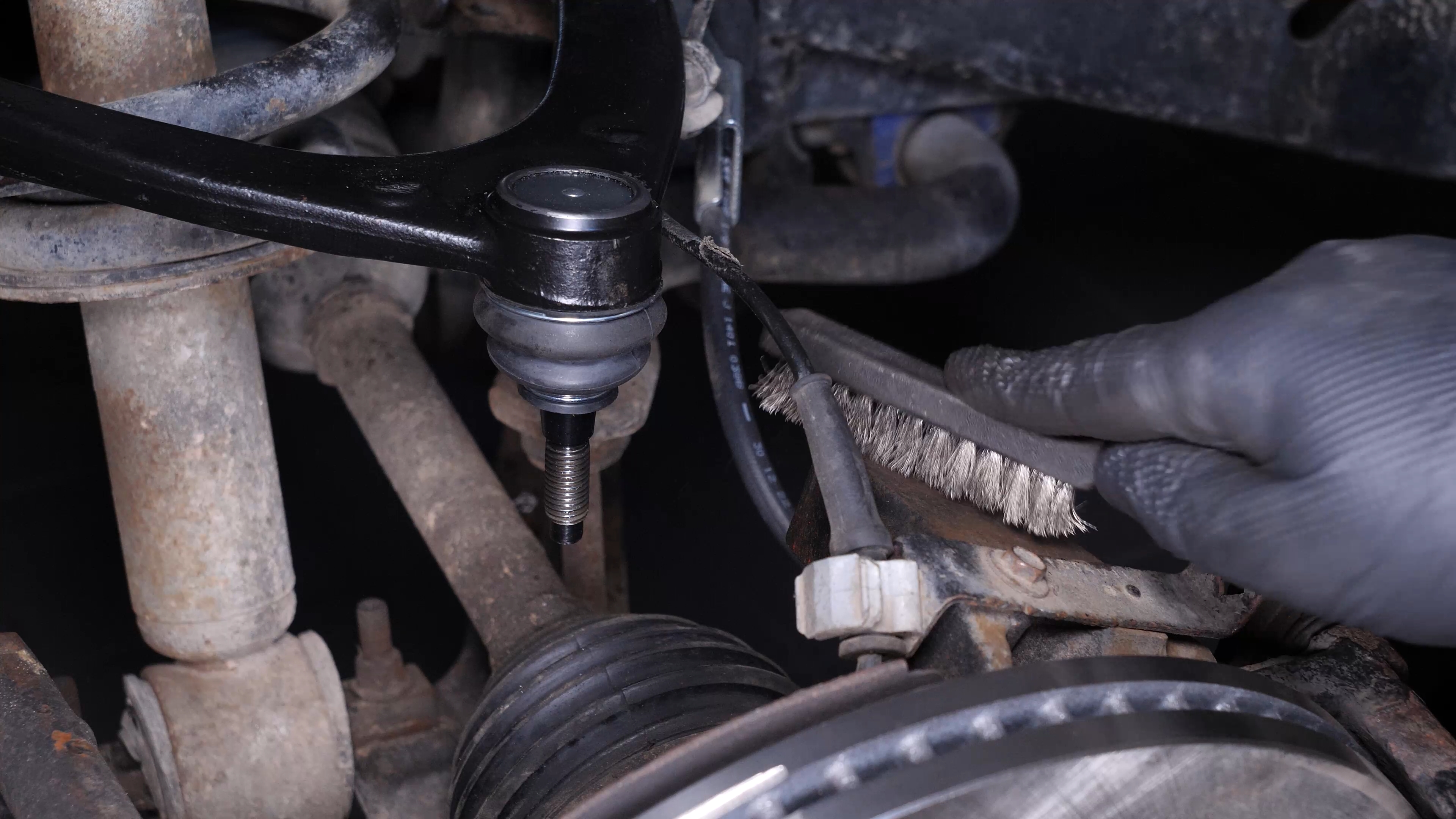 Put the control arm ball joint back