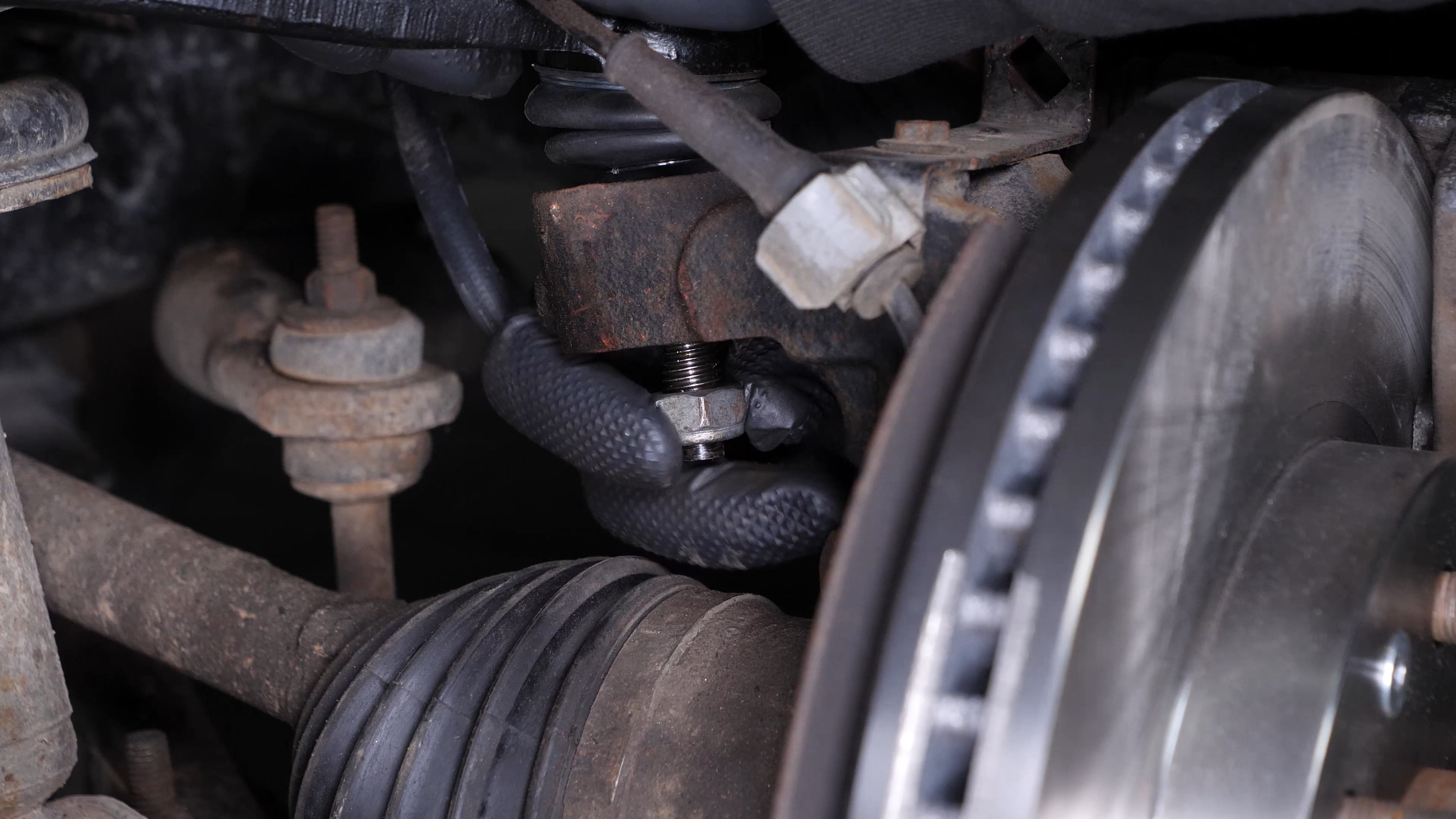 Put the control arm ball joint back