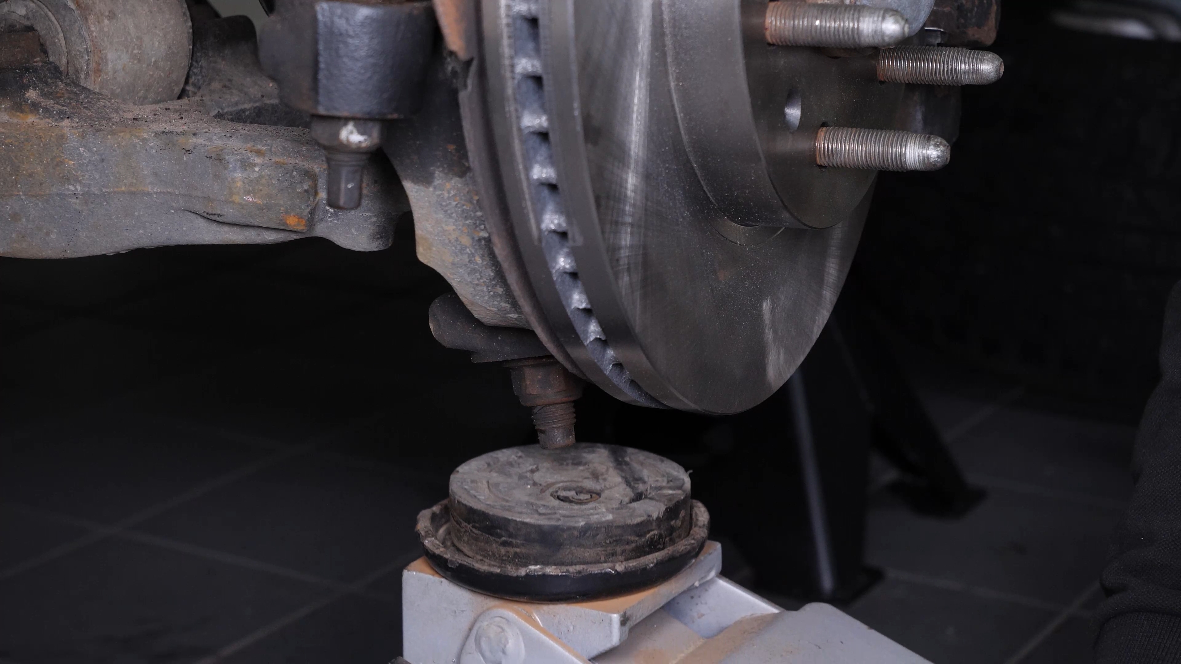 Put the control arm ball joint back