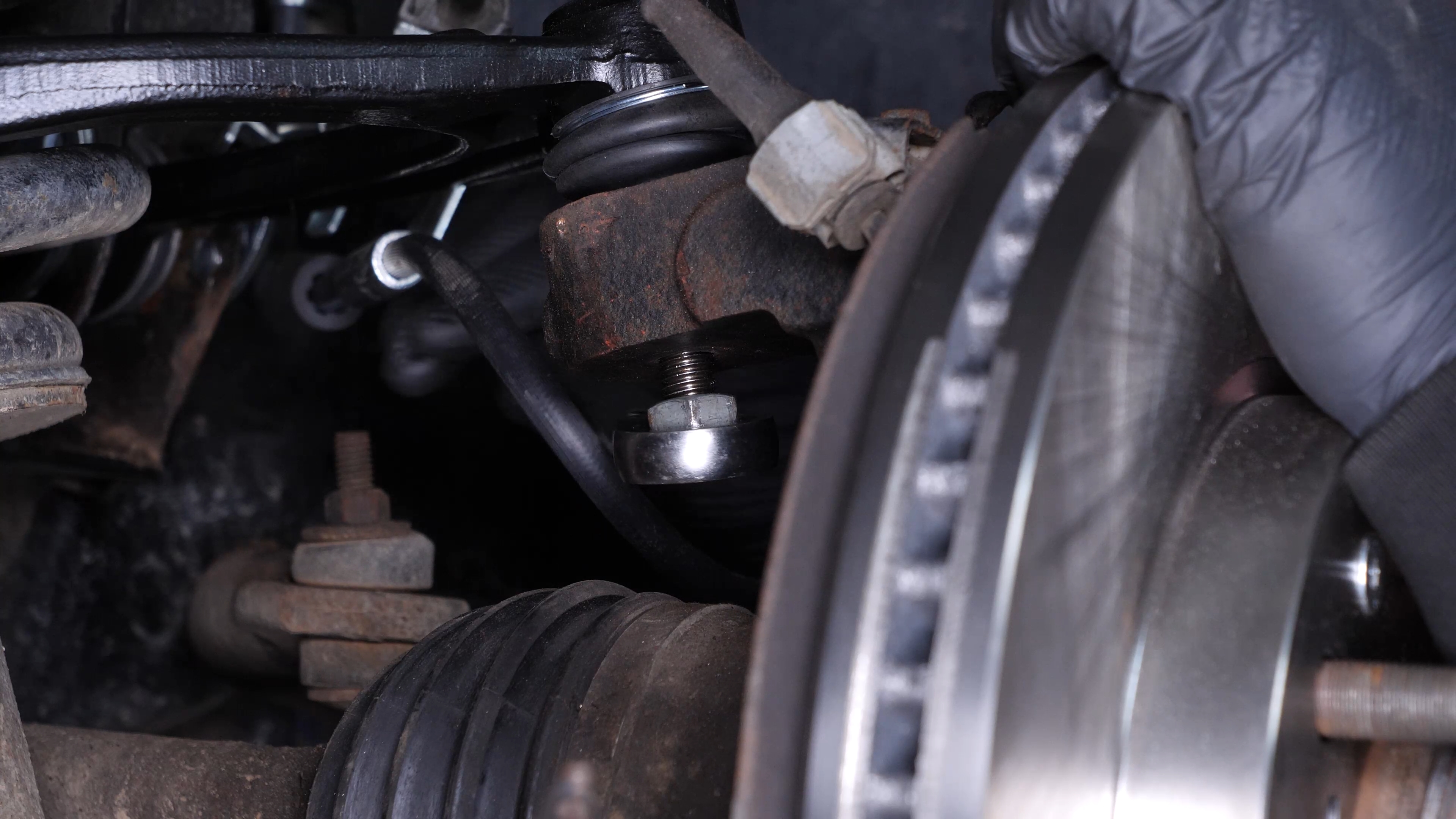 Put the control arm ball joint back