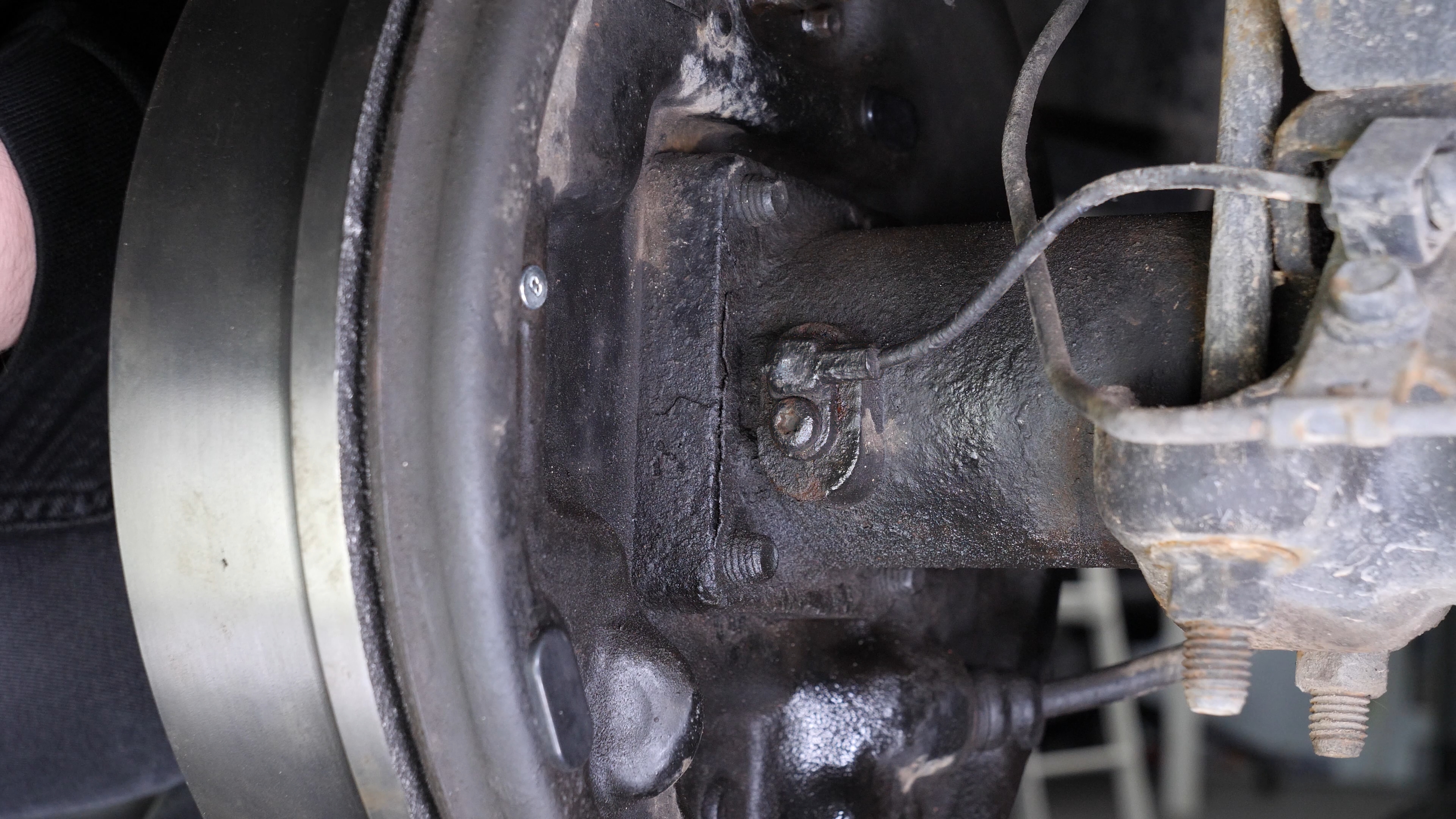 Remove the ABS sensor from the rear axle