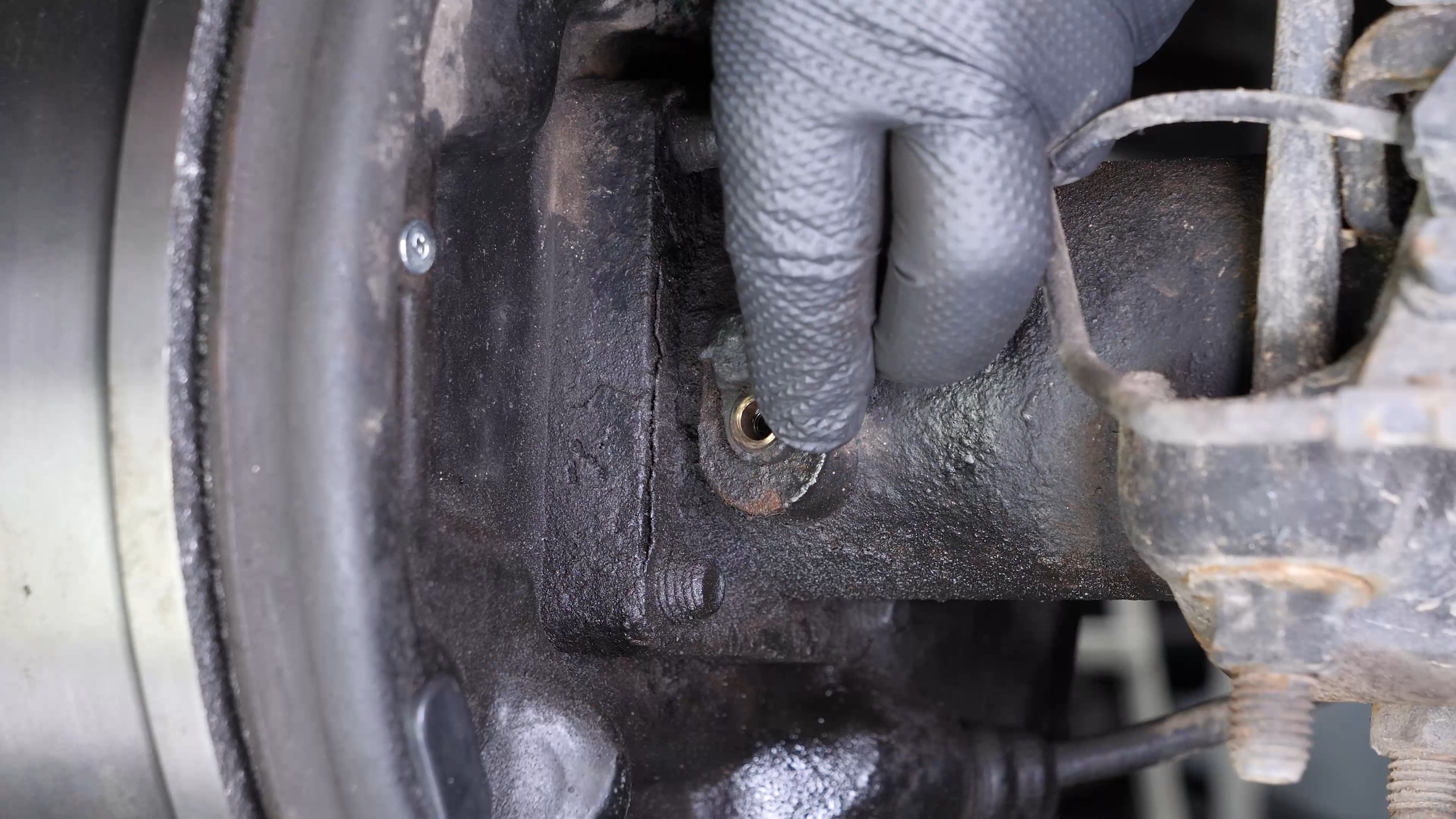 Remove the ABS sensor from the rear axle