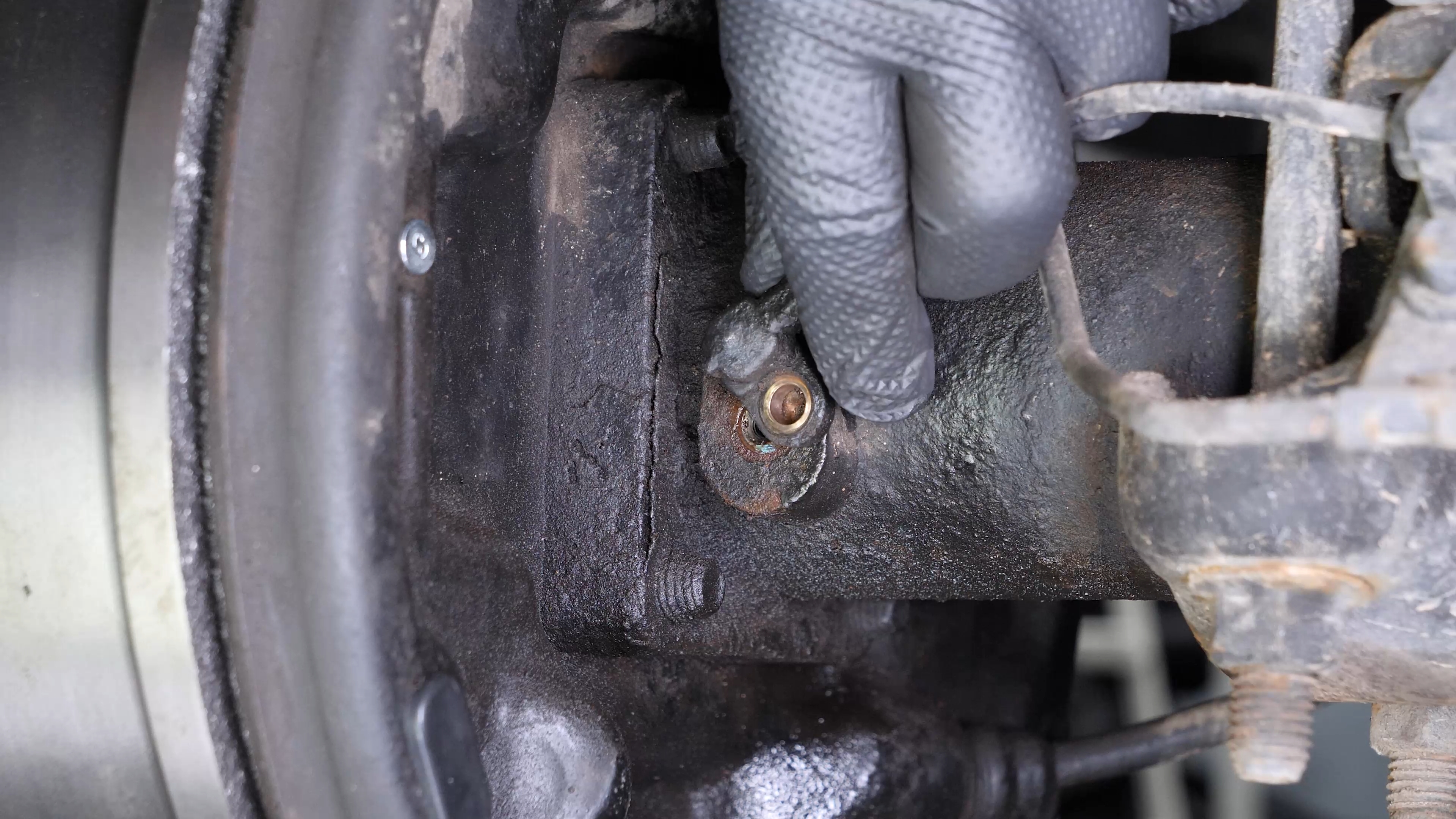 Remove the ABS sensor from the rear axle
