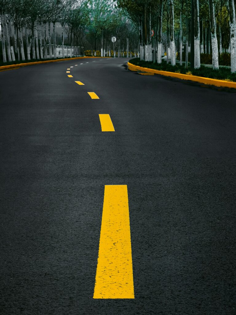 a broken yellow-line road