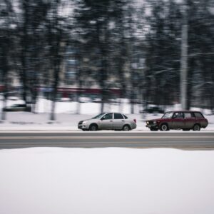 a car aboout to overtake another vehicle from the left