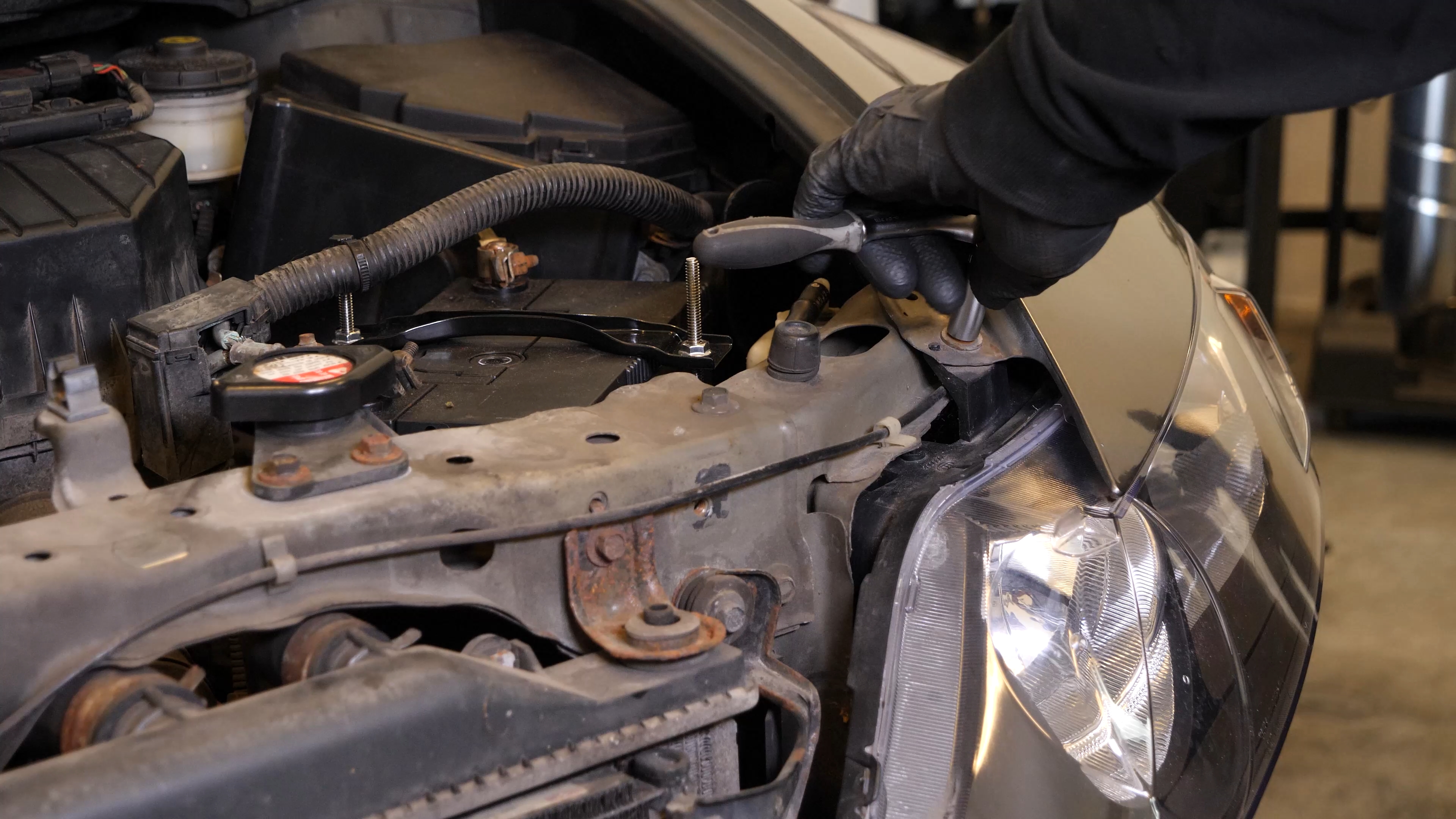 Remove the headlight housing