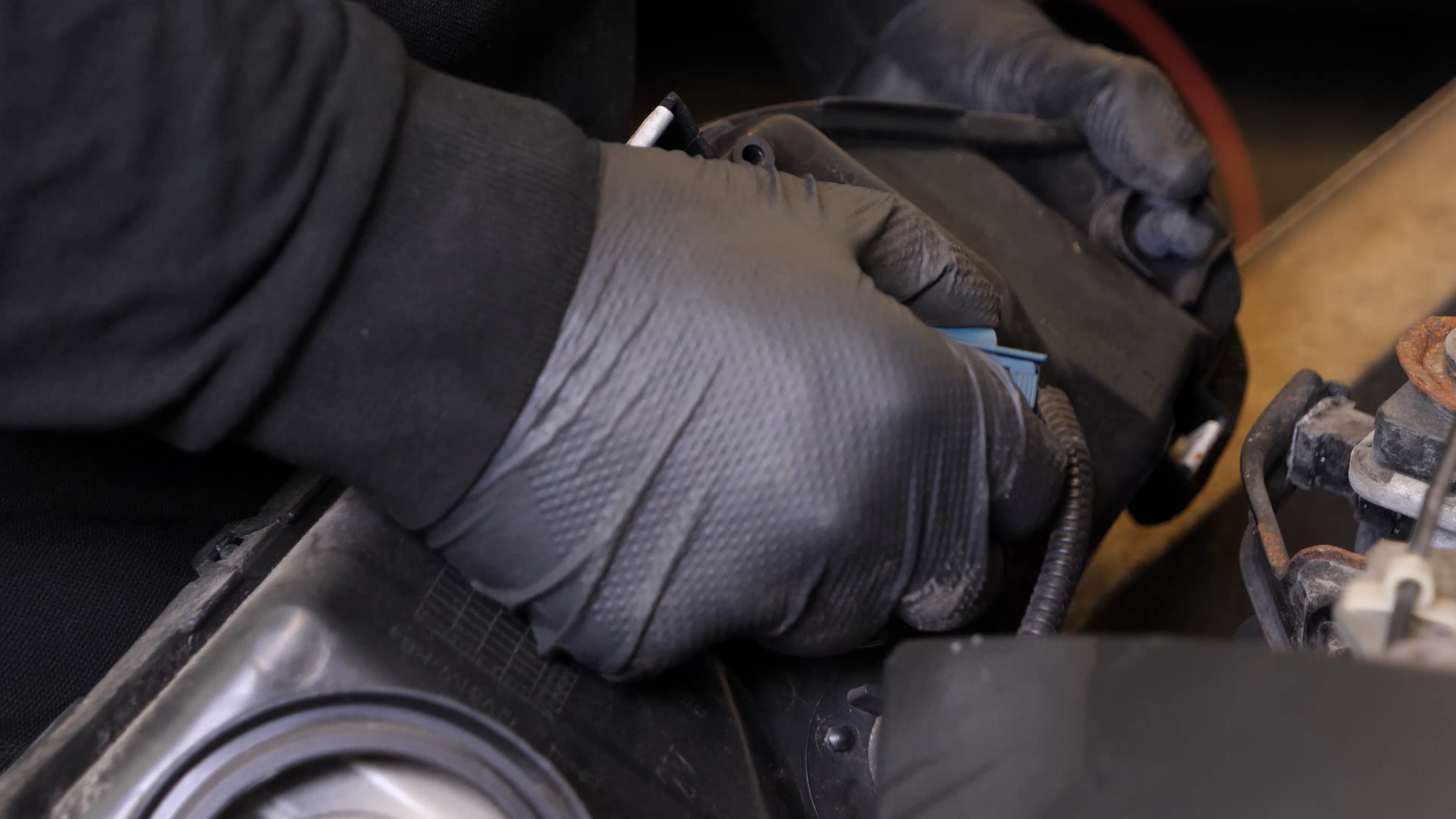 Disconnect the headlight assembly