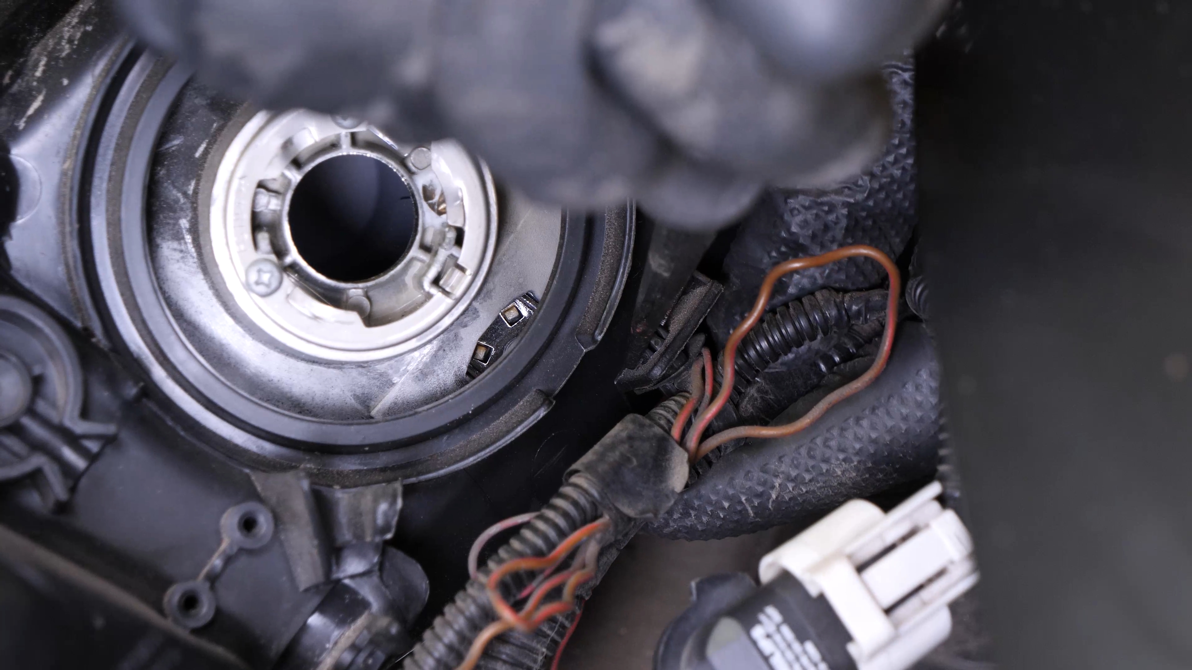Disconnect the headlight assembly