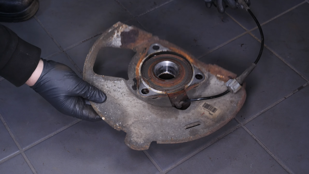Remove the brake backing plate