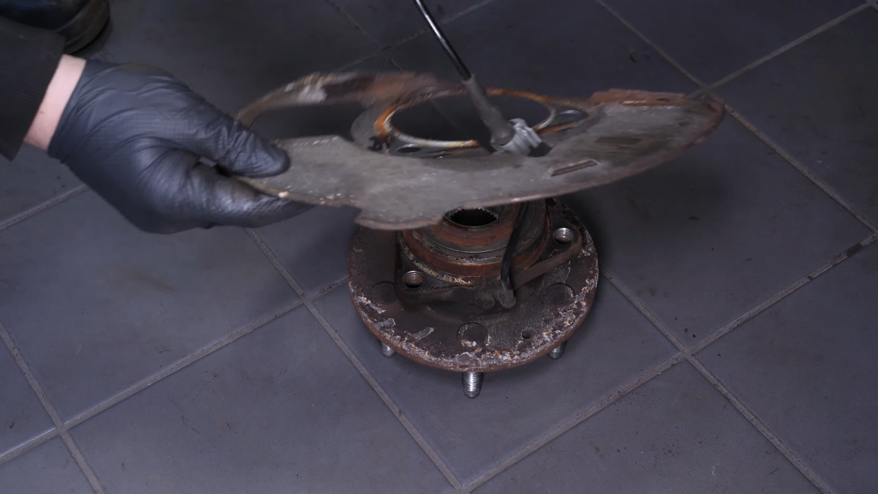 Remove the brake backing plate